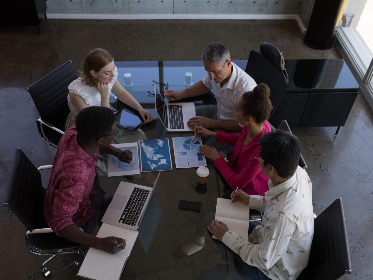 Diverse business colleagues busy at work